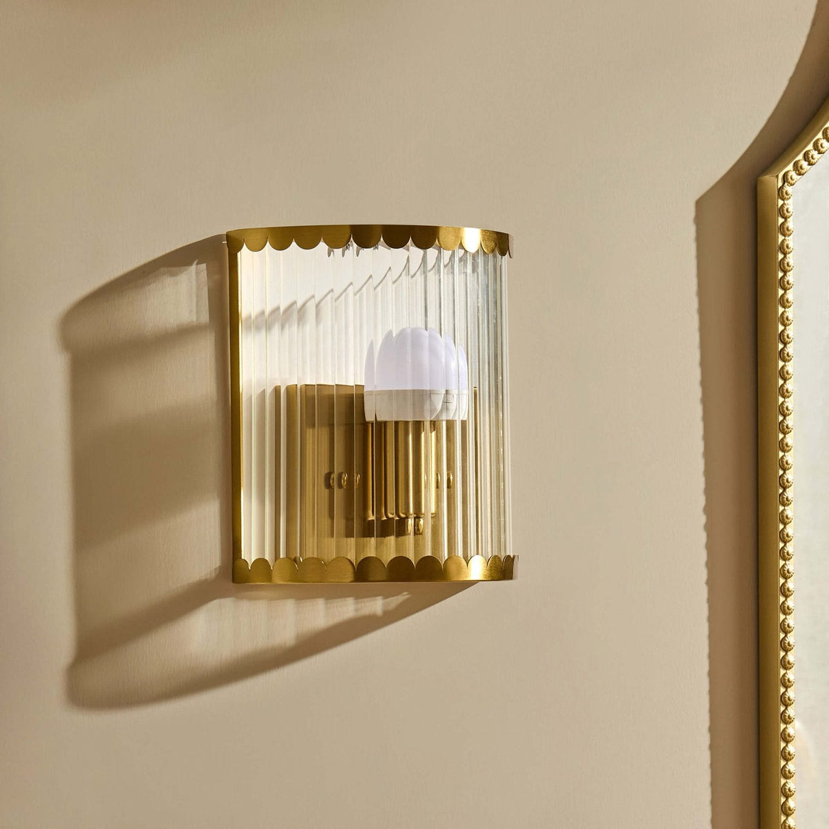 Rosie Glass Scallop Feather & Black Wall Light - Gold